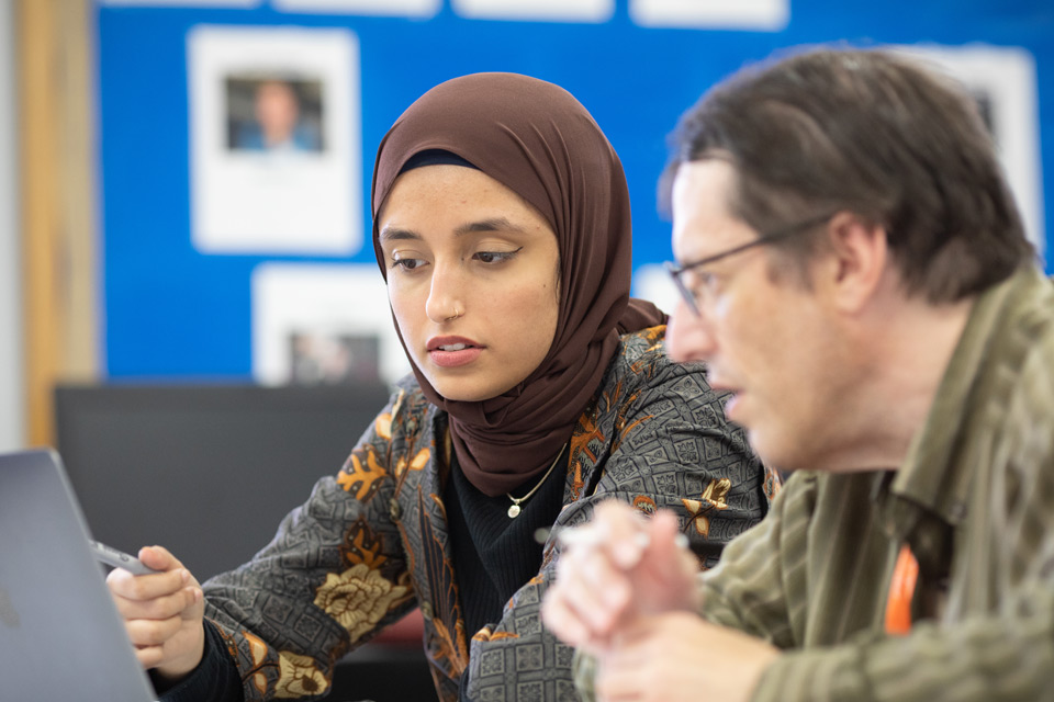 Muslim student and advisor on computer