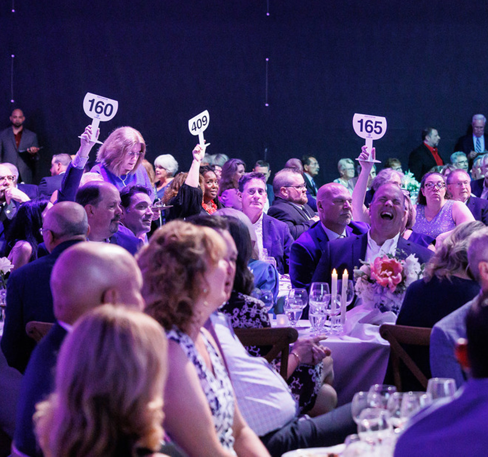 Chris Cree at a bar with Wine Award